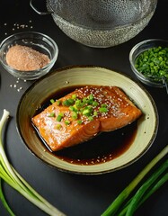 A salmon steak marinating in a soy sauce-based marinade, garnished with sesame seeds and green onions, set on a counter with Asian cooking utensils, emphasizing the fusion of flavors