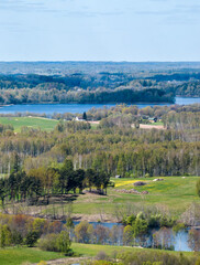 Fototapeta na wymiar Spring landscape by the Great Gausla lake, Latvian nature views, Latgale.