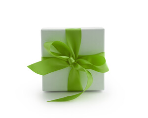 White gift box with green ribbon bow isolated on white background - 778169023