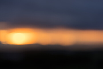 Bokeh defocused background of yellow sunset - 778171024