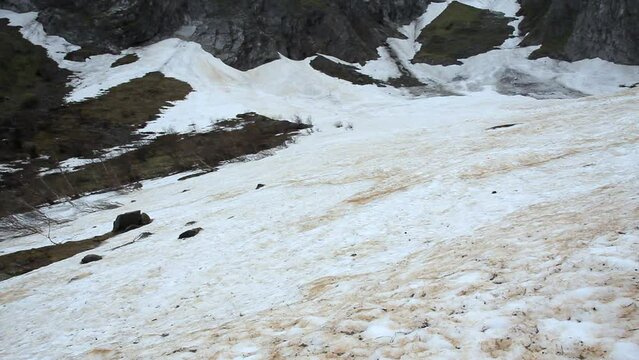 Snow melting in spring. Artiga de Lin, in the Aran Valley, located in the Catalan Pyrenees in Spain.
