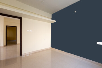 Newly constructed room with Dark Grey colored on one side wall. Unfurnished bedroom with loft....