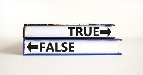 True or false symbol. Concept word True or False on beautiful books. Beautiful white table white...