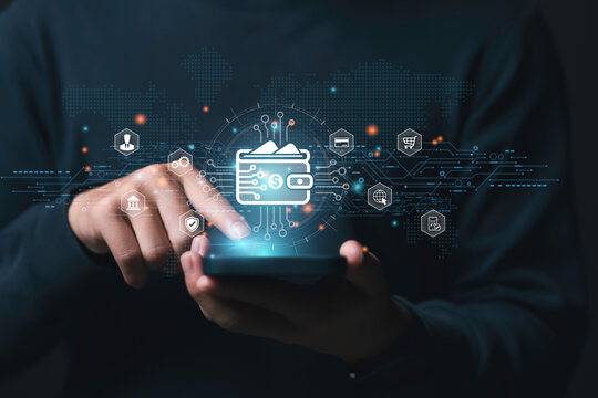 Businessman Hand Using smartphone for Online Payment by Digital Wallet. Transaction on Mobile banking, E-wallet on blockchain technology. transfer, credit card, financial, and global business online