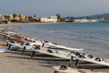 Windsurf boards on the Poetto beach in Cagliari. Sardinia, Italy