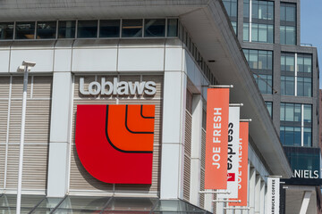 Fototapeta premium exterior building and sign of Loblaws, a grocery store, located at 10 Lower Jarvis Street in Toronto, Canada