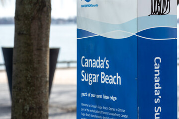 Fototapeta premium sign at Canada's Sugar Beach located at 11 Dockside Drive in downtown Toronto, Canada