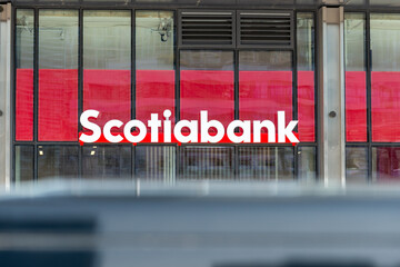 Fototapeta premium exterior building and sign of Scotiabank, a branch of the Bank of Nova Scotia, located here at 35 Cooper Street in downtown Toronto, Canada