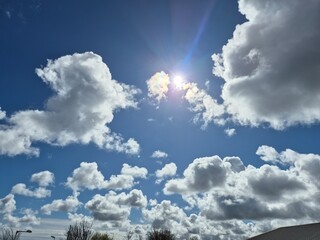 White fluffy clouds in the sky background. Cumulus clouds