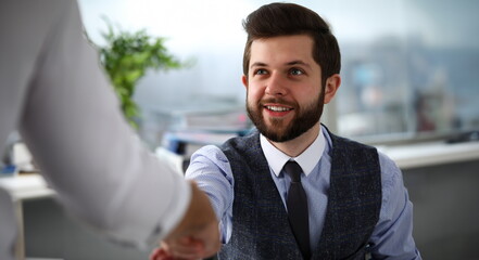 Man in suit and tie give hand as hello in office portrait. Friend welcome mediation offer positive...