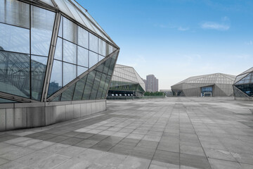 The appearance of modern buildings in empty squares and science museums