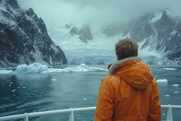 A cruise ship passenger enjoying a view of glaciers and icebergs in a polar region - obrazy, fototapety, plakaty