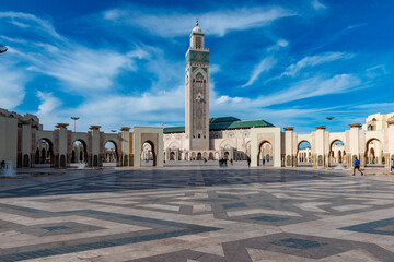 The Hassan II Mosque is a mosque in Casablanca, Morocco. It is the largest mosque in Morocco and the 7th largest in the world. - obrazy, fototapety, plakaty