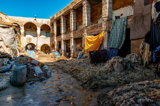 EZ, MOROCCO. Dec 05, 201The tannery in Fez. The tanning industry in the city is considered one of the main tourist attractions. The tanneries are packed with the round stone wells filled with dye
