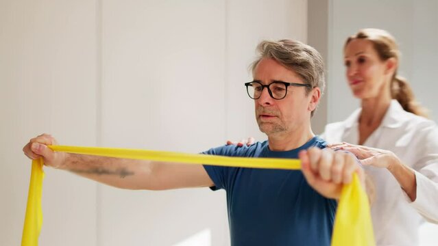 Physical Therapy Patient Using Physiotherapy Bands