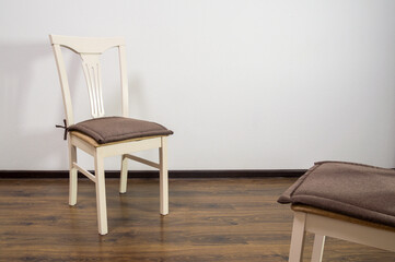 two empty chairs facing each other. A concept on the topic of psychotherapy