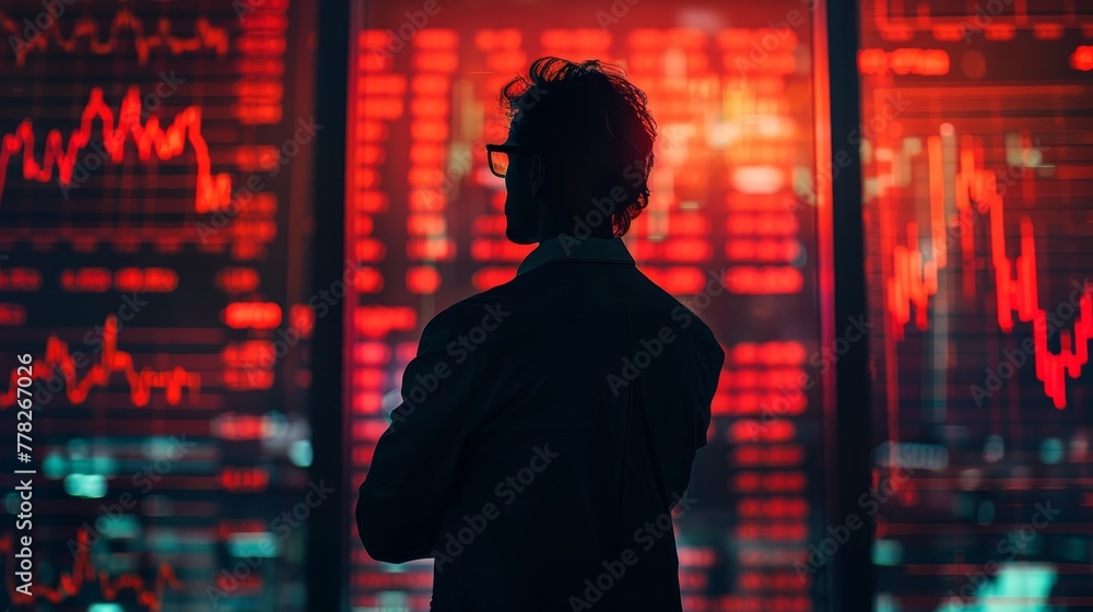 Poster a man is looking at a computer screen with red numbers on it. he is wearing glasses and a white shir