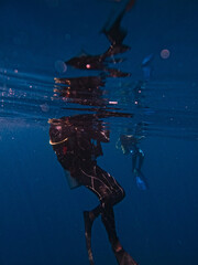 A scuba diver's suit at the surface