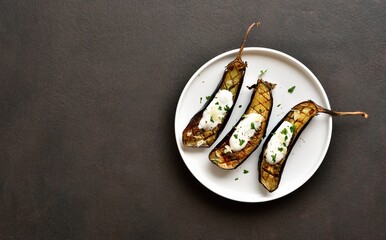 Baked aubergine with garlic yogurt dressing