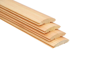 clean light linden boards lie on top of each other on a white background