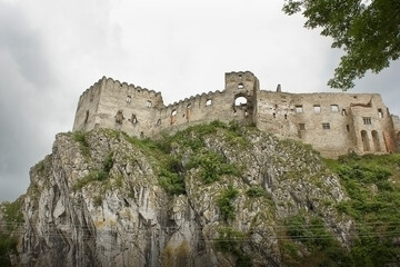 The ancient 12th century Beckov Castle in Slovakia. Landscape with a medieval castle on top of a mountain.