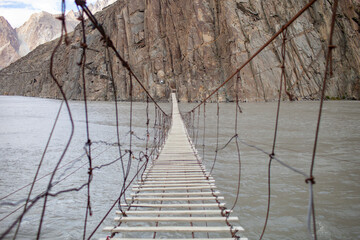 Hussaini Suspension Bridge Over Hunza River In Gojal Valley Of Hunza, Pakistan. Hussaini Suspension...