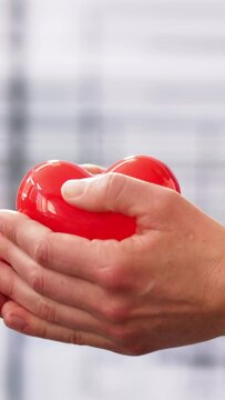 Close-up Of Woman Giving Red Heart