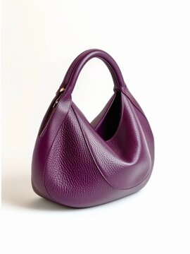 Purple leather hobo bag on white background.