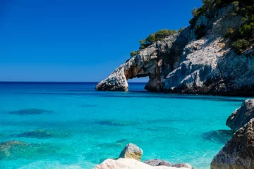 Foto op Plexiglas Cala Goloritzé, an azure beach located in the town of Baunei, in the southern part of the Gulf of Orosei, in the Ogliastra region of Sardinia. © guteksk7