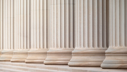 Architectural detail of some neoclassic columns in a row.