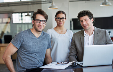 Portrait, collaboration and laptop in office for meeting with happy people, agency and web design....