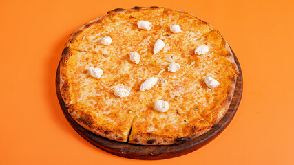 Mozzarella pizza isolated on orange background