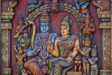 Obraz na płótnie Canvas Wooden Art, Hindu god ram idol made on wooden with hand work and filled with natural colours on display. Selective focus on object.