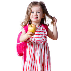 Girl child with backpack in hands apple looking smiling on white background isolation. Childhood, education, products children
