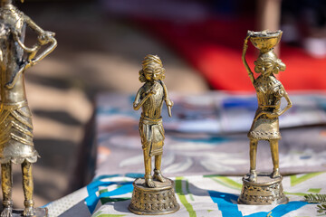 A handmade brass idol of indian farmer from tribal area is a stunning piece of art that blends...