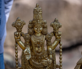 A handmade brass idol of Lord Tirupati Balaji is a stunning piece of art that blends craftsmanship...