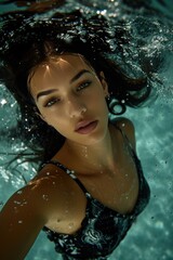 Aquatic Beauty: Stunning Brunette in Pool Backstroke