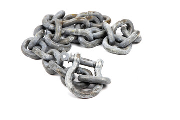 A galvanized steel shackle on a length of galvanized chain isolated on white