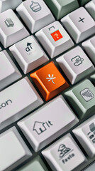 A keyboard with white keys and one orange key in the middle that says do it The other gray, green or black keys have simple icons on them such as an airplane symbol, flower petal shape, plus sign, etc