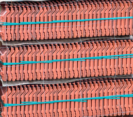 Roof tiles stacked on a pallet, visible from the side as a background - 778351487