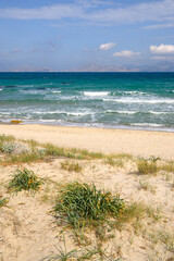 Beautiful Marmari beach with golden sand and emerald waters. Kos island, Greece