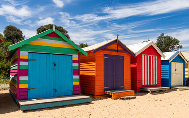 Naklejka premium Beautiful bathing houses on white sandy beach at Brighton in Melbourne, Australia.
