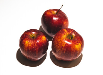Fresh red apples on white background