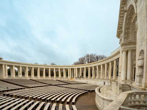 Arlington,VA – US – Mar 23, 2024 Wide angle of the Greek Revival styled Memorial Amphitheater, an outdoor amphitheater, exhibit hall, and nonsectarian chapel located in Arlington National Cemetery.