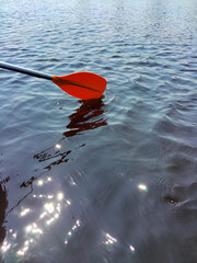 Kayak paddle overboard in river water. Active life and rest
