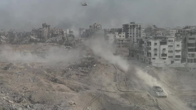 Tank driving with dust in al-shati refugee camp, Gaza, aerial
Drone view over North Gaza in the war with Israel. Gaza-March,20,2024
