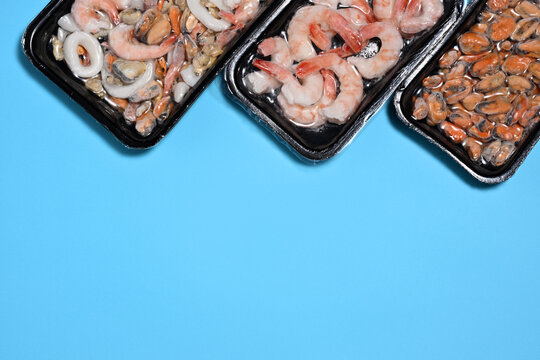 Plastic packages with seafood