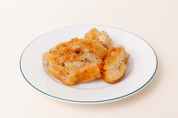 Chuoi nep nuong also known as Grilled banana wrapped in sticky rice, Vietnamese food isolated on white background, perspective view