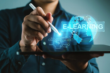 A man is drawing a globe on a tablet with the words e-learning written below. Concept of learning through technology and the importance of education in the digital age