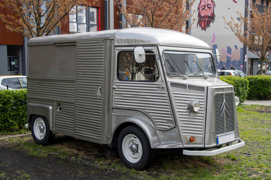 Silver Citroen H Van, 1969 model stands on a roadside, close up photo.